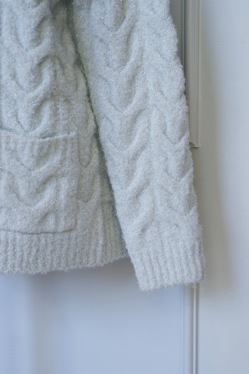 ケーブルニットカーデ