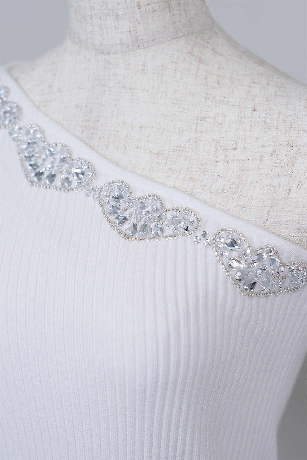 ワンショルビジュートップス