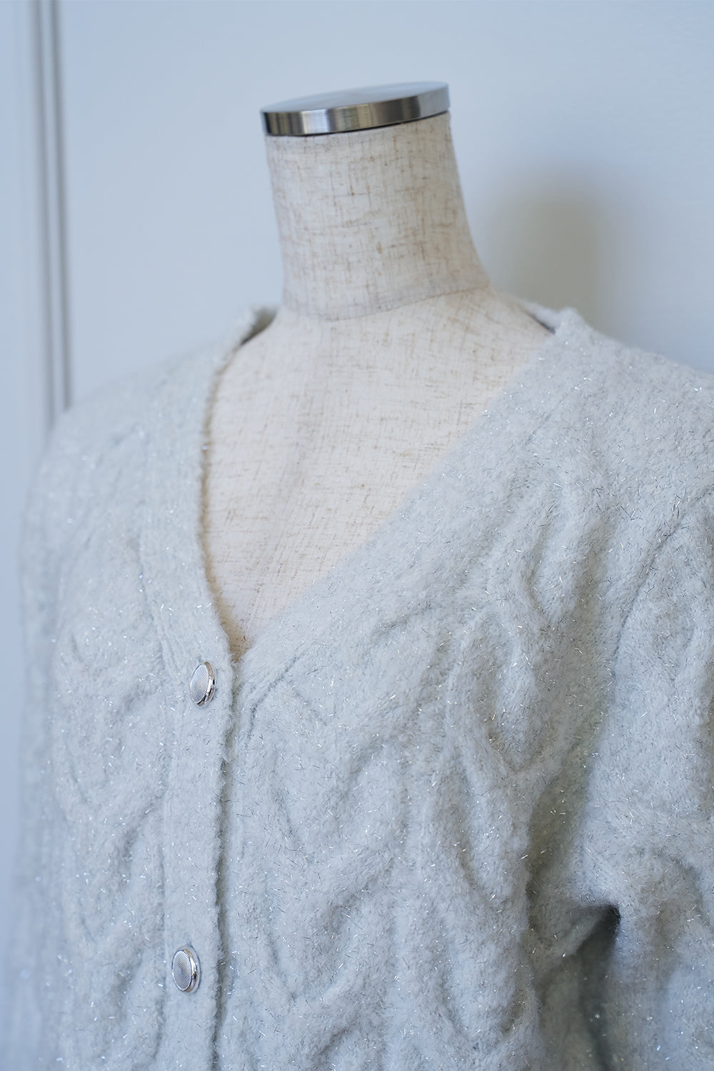 ケーブルニットカーデ