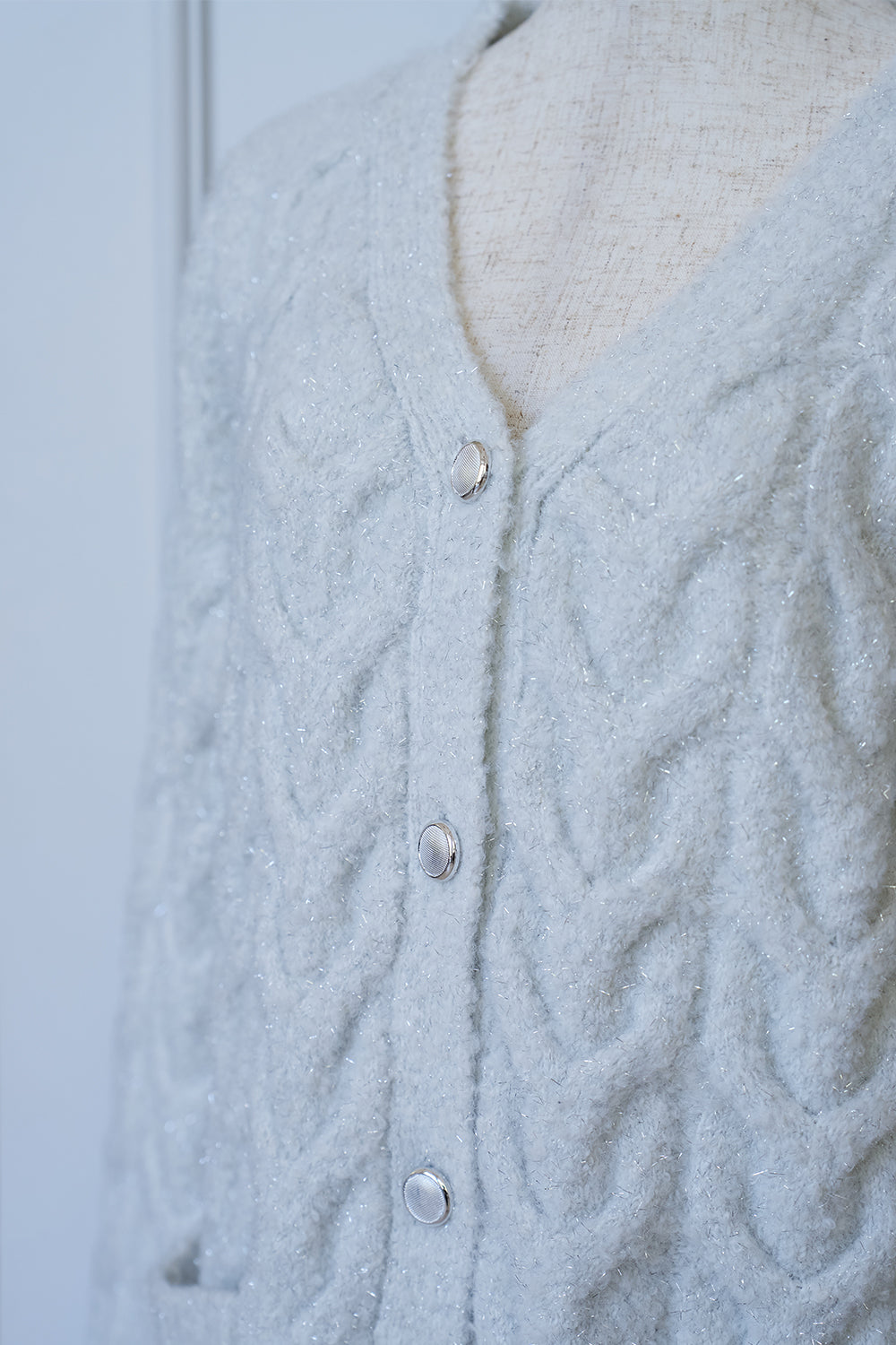 ケーブルニットカーデ